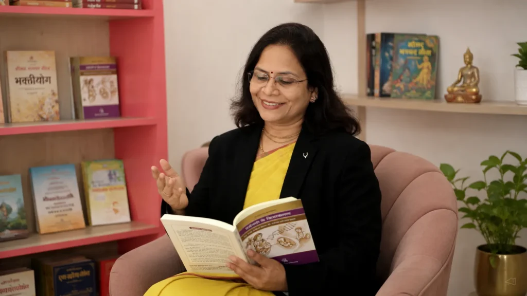 Dr. Vaidehi Deodhar reading from a Garbhasanskar book