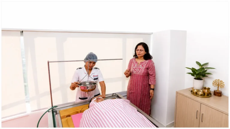 A Panchakarma therapy session in progress at the clinic